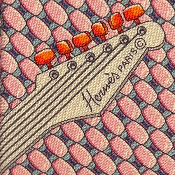 Hermes pink 646154 UA “Guitar” 100% silk tie new in box witout tags