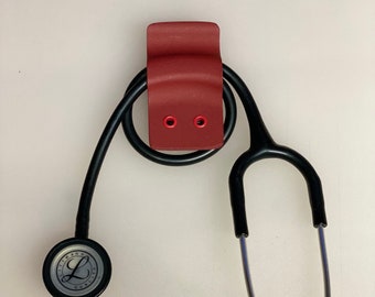 Clip/soporte para estetoscopio Kydex rojo EMT