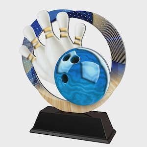 May include: A bowling trophy featuring a blue bowling ball and white bowling pins set against a blue and gold decorative background. The trophy sits on a black base, ideal for bowling awards and recognition.
