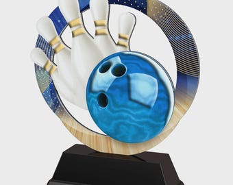 May include: A bowling trophy featuring a blue bowling ball and white bowling pins set against a blue and gold decorative background. The trophy sits on a black base, ideal for bowling awards and recognition.