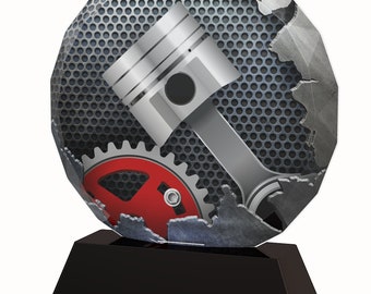 May include: A silver and red metal award with a piston and gear design. The award is on a black base.