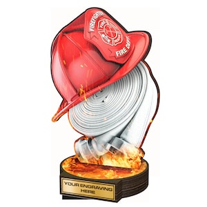 May include: A red firefighter helmet with a white fire hose and a gold plaque that says "Your Engraving Here" on a wooden base with flames.