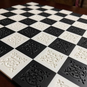 Chess Board 3D Printed with patterned pieces.