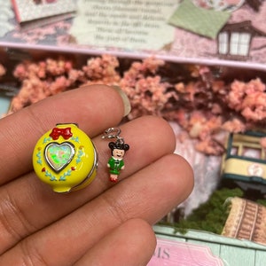 Polly pocket inspired charm with removable doll for standard charm bracelet. Only 1 more available