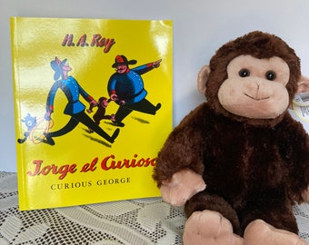 Jorge el curioso libro y peluche