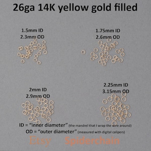 May include: Image of 26ga 14K yellow gold filled jump rings in various sizes. The image shows four groups of jump rings with different inner and outer diameters: 1.5mm ID/2.3mm OD, 1.75mm ID/2.6mm OD, 2mm ID/2.9mm OD, and 2.25mm ID/3.15mm OD.