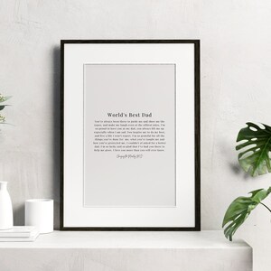 May include: A framed print with a white background and black text that reads "World's Best Dad". The text is a poem about a father's love and guidance.