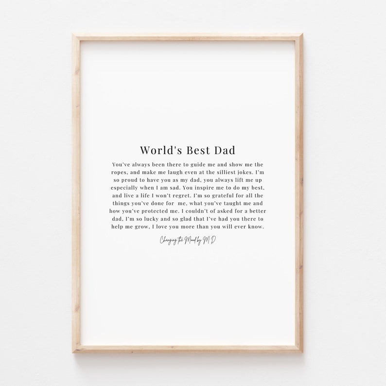 May include: A framed print with a white background and black text. The text reads "World's Best Dad" and includes a poem about a father's love and guidance.