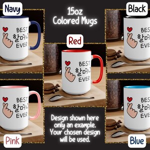 May include: Set of 15oz ceramic mugs with different colored rims. Each mug features a white background with a black and white illustration of a hand making a Korean heart gesture with the text "BEST 할머니 EVER" in black. The mugs are available in navy, red, black, pink, and blue.