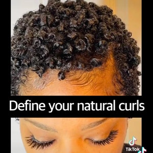 May include: Close-up of dark, tightly curled hair. The image features the text "Define your natural curls". Below the text is a close-up of long eyelashes. The image also includes social media handles and the word "TikTok".