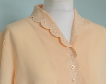 Vintage womens yellow scalloped short sleeve floral embroidered blouse: 1970s Ridella shirt