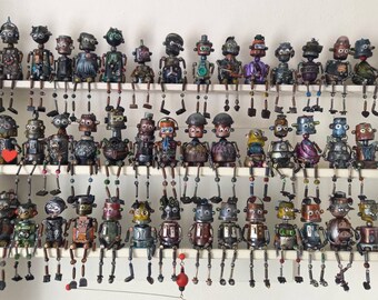Hand made, recycled, 100% unique, crazy, sitting robots.