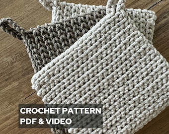 May include: Two crocheted pot holders with a loop handle. The pot holders are beige and brown. The image includes the text "CROCHET PATTERN PDF & VIDEO".