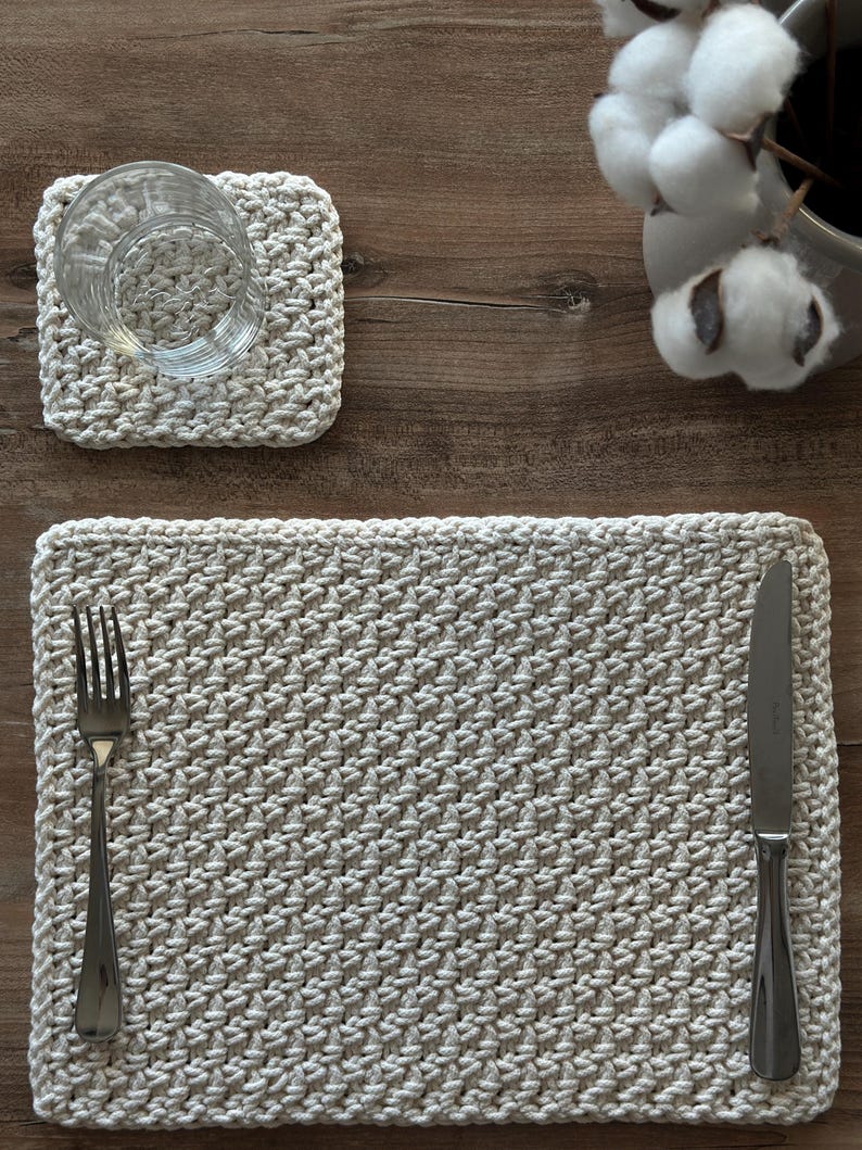 May include: A set of three ceramic mugs with a speckled, matte finish. The mugs are in shades of cream, light gray, and dark gray. Each mug has a simple, minimalist design and a rounded handle.