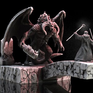 May include: A gray and white painted miniature figurine of a dragon with a fiery mane and a wizard holding a staff and sword. The dragon is standing on a stone bridge with a rocky base.