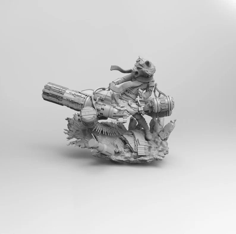 May include: A gray, detailed figurine of a character riding a futuristic, weaponized vehicle. The character is wearing a hooded cloak and holding a weapon. The vehicle has a large, cylindrical barrel and a complex design.