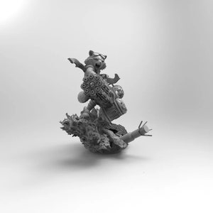 May include: A gray 3D printed figurine of a raccoon character holding a weapon, standing on a rocky base. The character is wearing a helmet and has a determined expression.