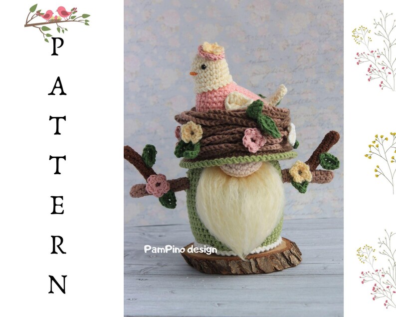 May include: A handcrafted crochet gnome featuring a bird in a nest design. The gnome has a white beard, a green body, and a brown hat with a nest. The bird is pink and beige. The gnome is on a wooden base. The word "PATTERN" is written vertically.