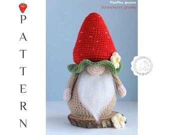 Gehaakt kabouterpatroon aardbei, gehaakte amigurumi-aardbeienkabouter, eten gehaakte aardbei met bloem