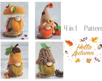 May include: Four crochet gnome figures with autumn-themed hats and beards. The gnomes are in the shape of a mushroom, acorn, and pumpkin. The phrase "Hello Autumn" is displayed with fall leaves.
