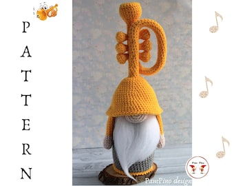 May include: A handmade crochet gnome with a yellow trumpet on its head. The gnome has a white beard, a gray and beige body, and a yellow hat. The word "PATTERN" is written vertically on the left side of the image.