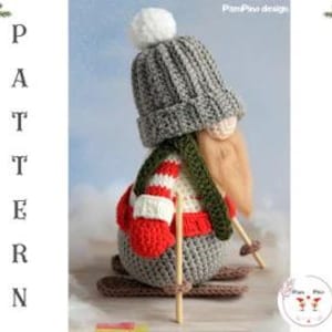 May include: A crocheted gnome wearing a gray knit hat with a white pom-pom, a red and white striped scarf, and a red and white sweater. The gnome is on skis and holding ski poles. The word "PATTERN" is written vertically on the left side of the image.
