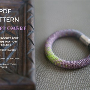 May include: A PDF pattern for a violet ombre bead crochet rope bracelet. The pattern includes charts, photos, seed bead color codes, tips, and materials and tools suggestions. The bracelet is made with 12 beads in a row and 4 colors.