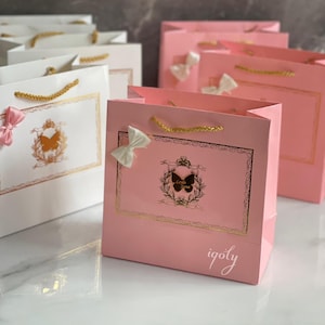 Bolsas personalizadas, bolsas de regalo para fiestas, bolsos de mano para regalos, bolsas de cartón, bolsas de regalo para bodas, bolsas coloridas, regalos para baby shower, regalos de bautismo, para invitados