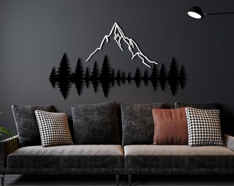 May include: A black metal wall art sculpture depicting a mountain range with a white outline and a forest of trees at the base.