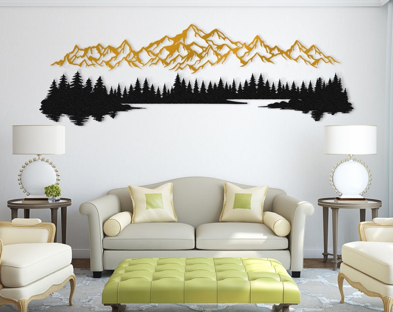 Long horizontal mountain metal wall decor displayed over a living room sofa