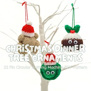 May include: Handmade Christmas tree ornaments in the shape of a bear, Christmas pudding, and a green ball, each wearing a knitted hat. The ornaments are suspended from a white tree. Text on the image reads "Christmas Dinner Tree Ornaments".