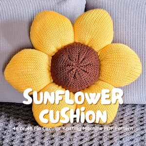 May include: A yellow knitted sunflower cushion with a brown center. The cushion is made for a 46 or 48 pin circular knitting machine. "Sunflower Cushion" is written in white text on the cushion.