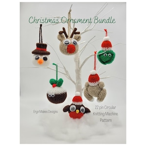 May include: A collection of handmade Christmas ornaments, including a snowman, reindeer, and robin, all with googly eyes. The ornaments are suspended from a white tree. The text "Christmas Ornament Bundle" and "Eryn Makes Designs" are visible.