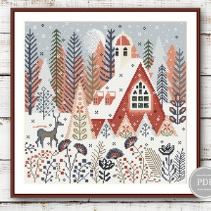 May include: Cross stitch pattern featuring a red and white house with a snowy roof in a winter forest. The house has a large window and a chimney. There are trees, a deer, and flowers in the scene. The pattern is in PDF format.