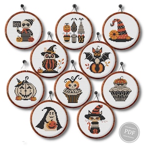 May include: Ten circular cross-stitch designs with Halloween motifs, each framed in wood. The designs depict various Halloween elements such as a skeleton, owl, bat, and pumpkin. The colour palette includes orange, black, and white, with wooden frames.