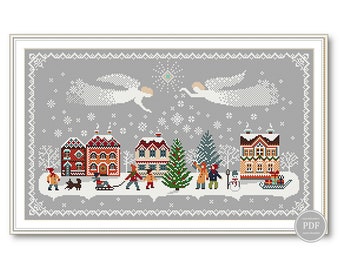 May include: Cross-stitch pattern featuring a winter village scene with houses, a Christmas tree, and angels in the sky. The pattern is on a gray background with white snowflakes.