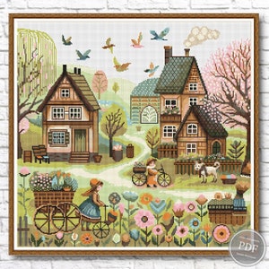 May include: A cross-stitch pattern featuring a charming village scene with two houses, a blooming tree, and a path leading to a flower garden. Two children ride bicycles in the foreground, while birds fly overhead.