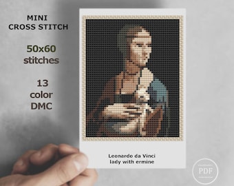 May include: A cross stitch pattern of Leonardo da Vinci's Lady with an Ermine, a classic Renaissance painting. The pattern is 50 stitches wide by 60 stitches high and uses 13 colors of DMC floss.