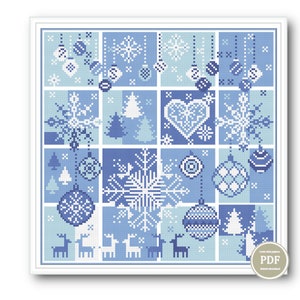 May include: A blue and white cross-stitch pattern featuring a variety of winter holiday motifs, including snowflakes, baubles, reindeer, and Christmas trees.