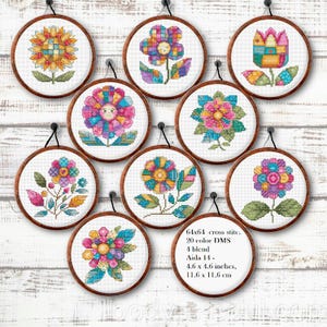 May include: A collection of ten colorful cross-stitch floral designs displayed in round wooden hoops. Each design features a unique flower with vibrant hues and intricate details. The text in the image reads: 64x64 cross stitch, 20 color DMS, 4 blend, Aida 14 - 4.6 x 4.6 inches, 11.6 x 11.6 cm.