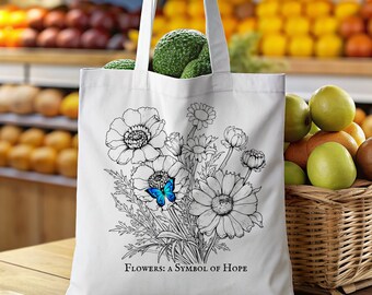 Könnte beinhalten: Weiße Einkaufstasche mit einer Schwarz-Weiß-Zeichnung von Blumen und einem blauen Schmetterling. Der Text "FLOWERS: A SYMBOL OF HOPE" ist unten auf der Tasche aufgedruckt.