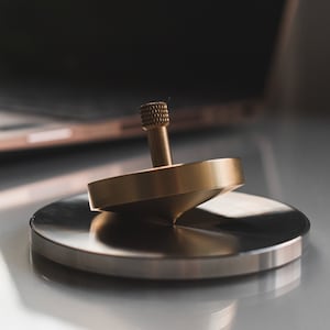 Luxury Brass Spinning Top with Metal Base