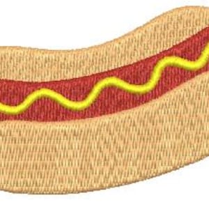 May include: An embroidered image of a hot dog. The hot dog has a red sausage, yellow mustard, and is nestled in a tan bun. The image is a close-up, with the details of the embroidery visible.