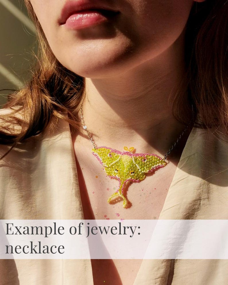 Handmade beaded Luna Moth necklace shown worn, example of finished jewelry from the triangular weave beading pattern