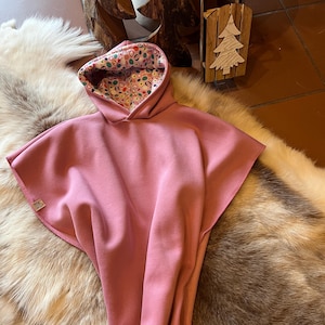 Children&#39;s car seat poncho with hood. Essential for the safety of your baby and toddler. Winter sweat