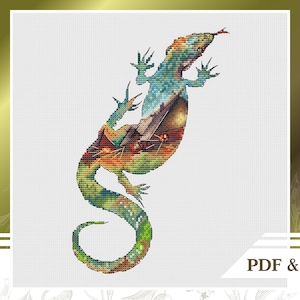 Könnte beinhalten: Ein farbenfrohes Kreuzstichmuster eines Eidechsen mit einem Landschaftsdesign in seinem Körper.