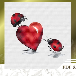 May include: Two red ladybugs with black spots are on a white background. One ladybug is on top of a red heart. The other ladybug is below the heart and appears to be pushing it.