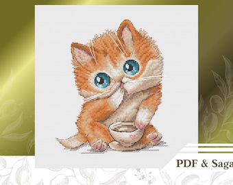 May include: A cross-stitch pattern of a cute orange kitten with blue eyes drinking from a teacup. The kitten is sitting on a white background.