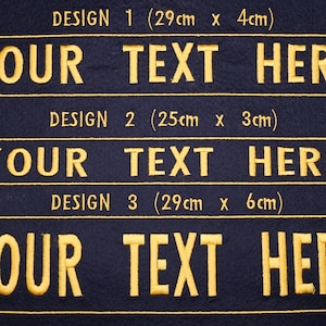 May include: Three embroidered patches with the text "YOUR TEXT HERE" in gold on a navy blue background. The patches are rectangular with rounded corners, and the dimensions are listed above each design.