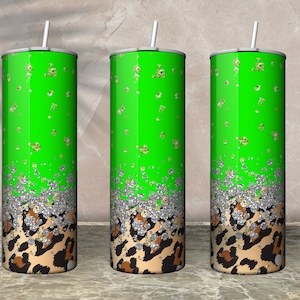 May include: Three stainless steel tumblers with a green and silver glitter design and a leopard print base.